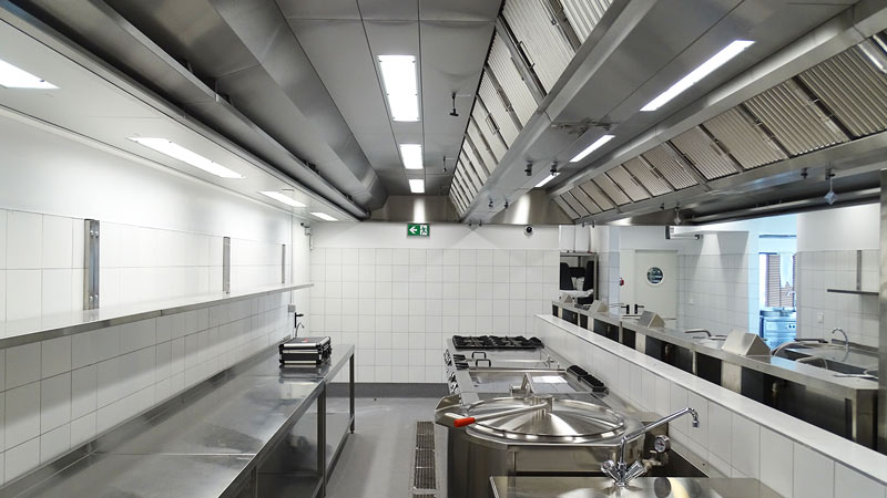 Individually manufactured ventilation ceiling Individually manufactured ventilation ceiling in a hotel kitchen